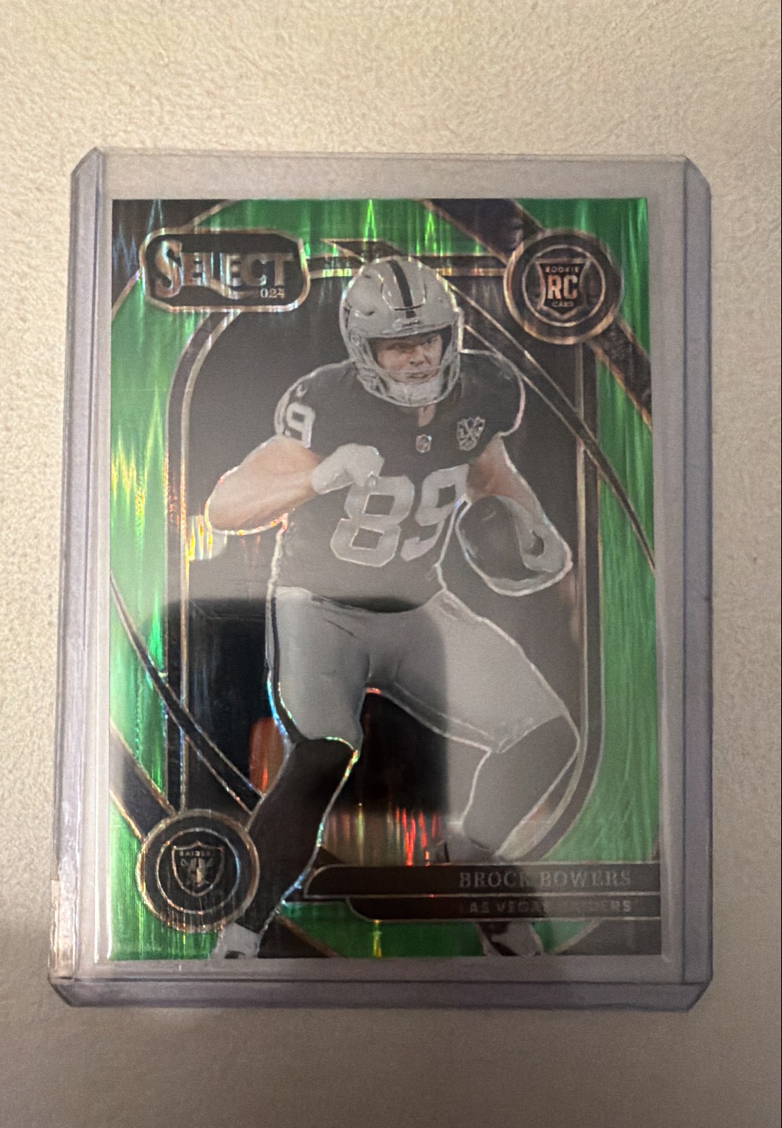 2024 Select - Club Level Brock Bowers #222 Neon Green Shock Prizm 437/499 (RC)