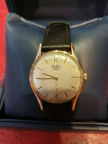 Vintage 9ct gold Bentima Watch on black 