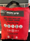 Universal multi grip snow socks for car tyres. 1 pair in bag, used once
