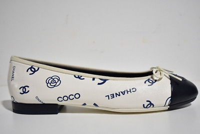 Chanel 23P White Navy Blue CC Coco Logo Cap Toe Bow Tie Ballet