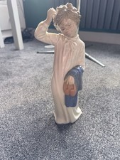 Ladro Nao Porcelain classic Figurine of boy at bedtime
