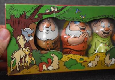 NESTLE COLLECTION OF SNOW WHITE'S SEVEN DWARFS IN HOLLOW MILK