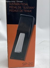Pédale d'amortisseur Casio SP-20 noir instrument de musique piano sustain dans sa boîte