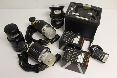 Profoto Pro 7B Pack With 2 Pro B Heads w disc reflector, 2 Batteries And Charger