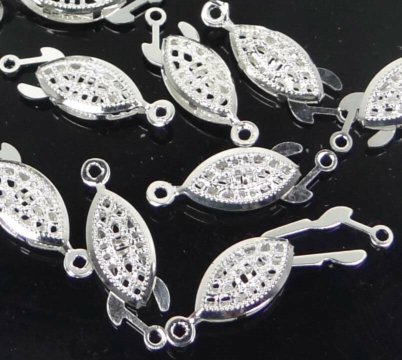 filigree fish hook clasp Craftdady 12pcs Oval Pearl Golden Single Strand Jewelry Clasp Connector for Bracelet Necklace Making Replacement A slender filigree fish hook clasp with a plated metal finish  adds a delicate 14K Gold Filled Filigree Necklace