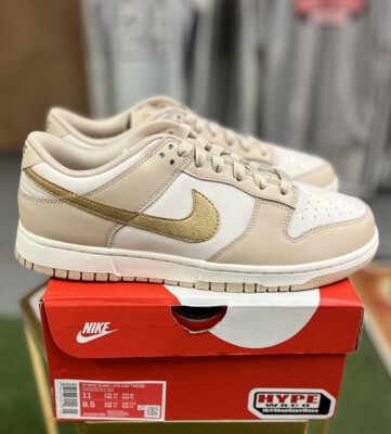 dunk low gold swoosh