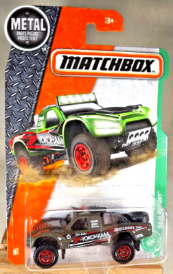2016 Matchbox 119/125 Explorers BAJA BANDIT Dark Olive w/Dark Red Ring Flower Sp