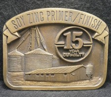 XB25127 VINTAGE 1970s  SOY ZINC PRIMER / FINISH  AGRICULTURE BRASS BELT BUCKLE