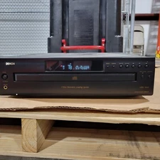 denon dcm-27 cd changer used powers up one owner