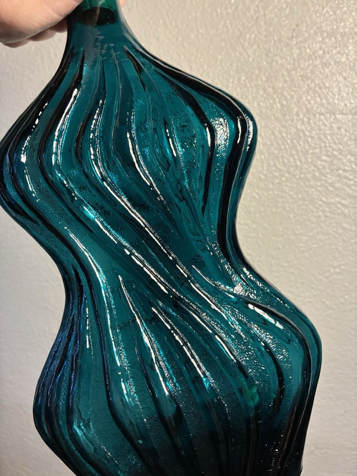 Wavy teal glass decanter with grape motif — MCM glassware that genuinely earns the word 'rare' for once.