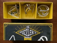 The PUZZLER'S GUILD Set of 3 Metal Puzzles 2015