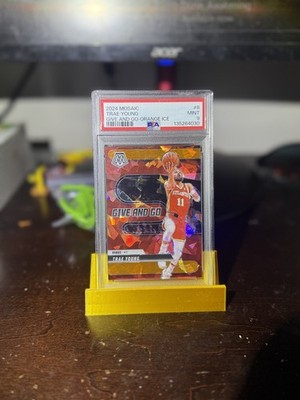 2024-25 Panini Mosaic - Give and Go Trae Young #8 Orange Ice Mosaic Prizm /49