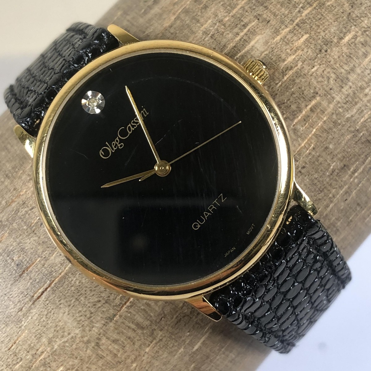 Oleg Cassini Watch Womens 32mm Black Gold Tone Quartz Japan
