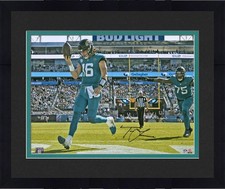 Framed Trevor Lawrence Jaguars Signed 16x20 Teal Rush Touchdown Photograph