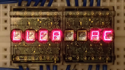 🇬🇧 2pcs HPDL-1414 alphanumeric red 17-segment LED bubble display,retro vintage - Video 1 of 1