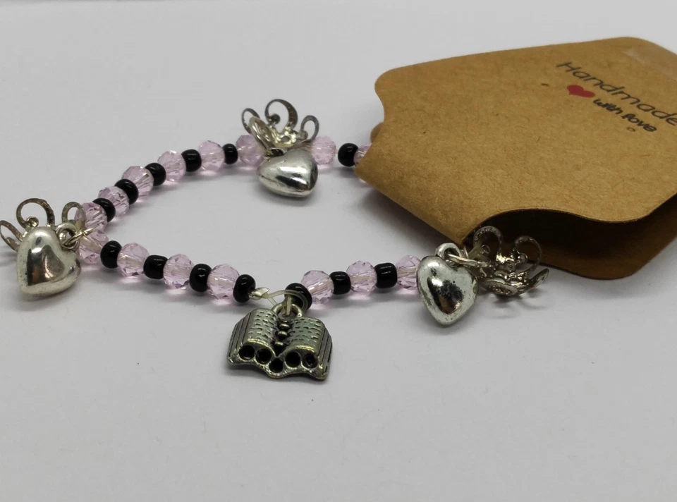 Pulsera elástica hecha a mano con corazón y libro de amor infantil con bolsa de regalo Foto 3 de 4