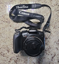 Canon PowerShot SX10 IS 10MP Digital Camera w/20x Zoom And Case