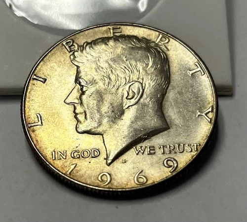 1969-D Kennedy Half Dollar 40% Silver - AU About Uncirculated, Some Toning.