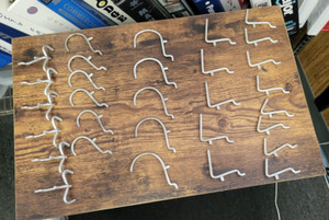 ASSORTMENT OF PEGS FOR RETAIL