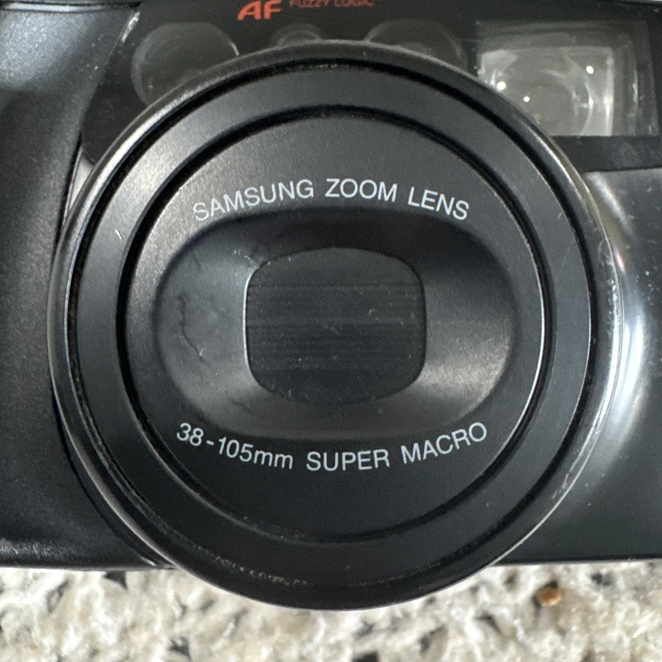 Cámara fotográfica compacta Samsung Máxima Zoom 105 35 mm - negra sin probar. Foto 3 de 4