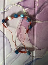 Handmade Beaded Braclet In between each thread contains  amazonite &lapus lazuli