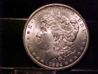 * 1884-CC CHOICE + MS MORGAN SILVER DOLLAR