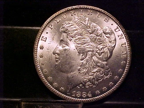* 1884-CC CHOICE + MS MORGAN SILVER DOLLAR