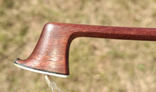 Violin bow 4/4 stamped ADAM silver mounted ....... 1,3