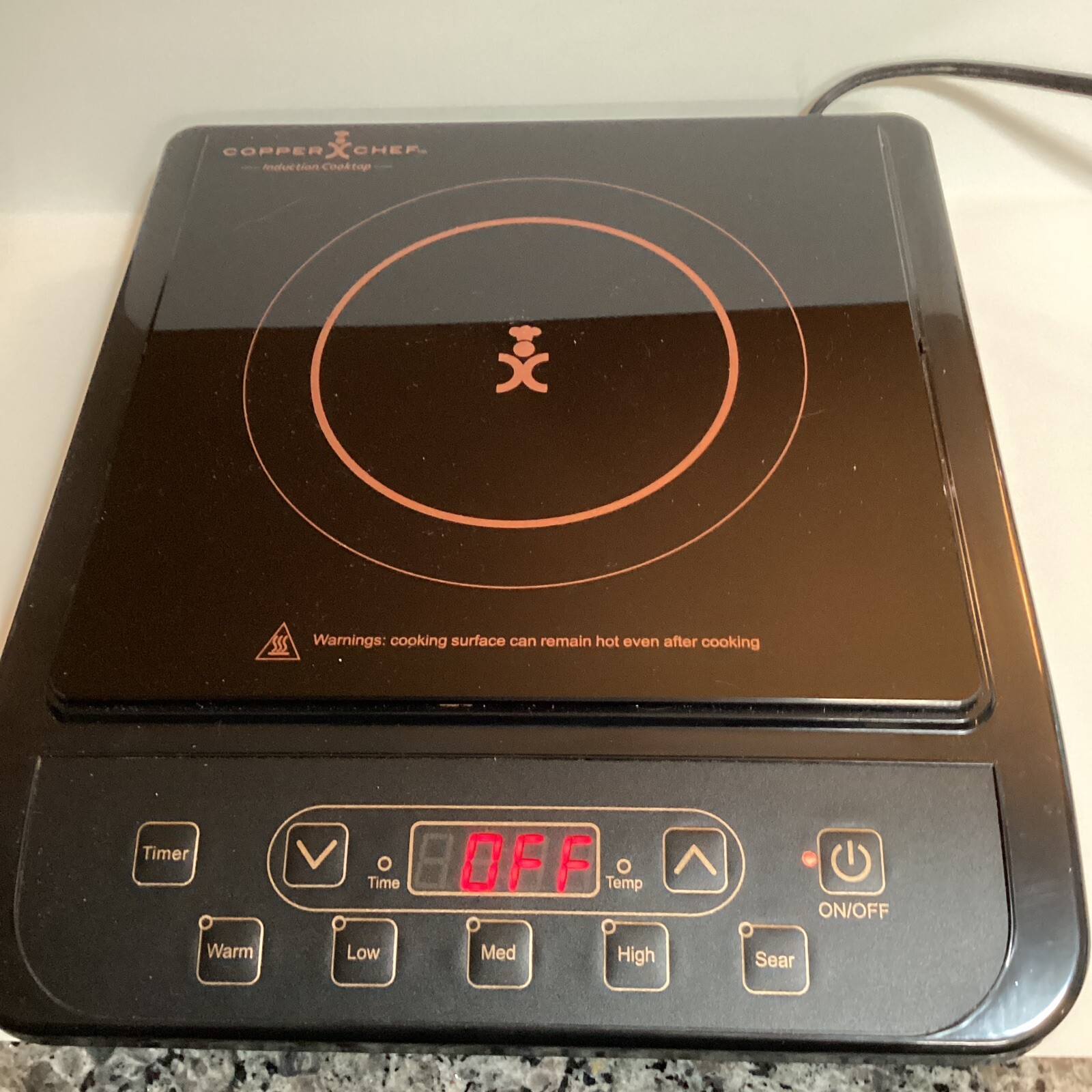 Copper chef induction cooktop with copper griddle