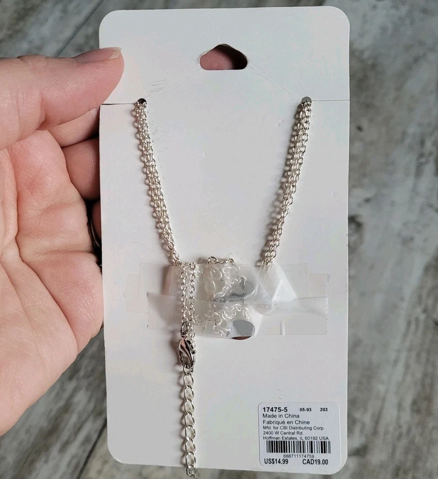 Collares Claire's 2 Piezas Best Friends Tono Plateado Corazón Brilla en la Oscuridad Azul Foto 3 de 4