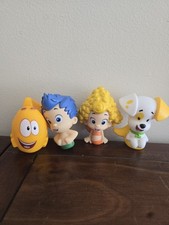 Set Of 4 Bubble Guppies Water Squirter Figure...