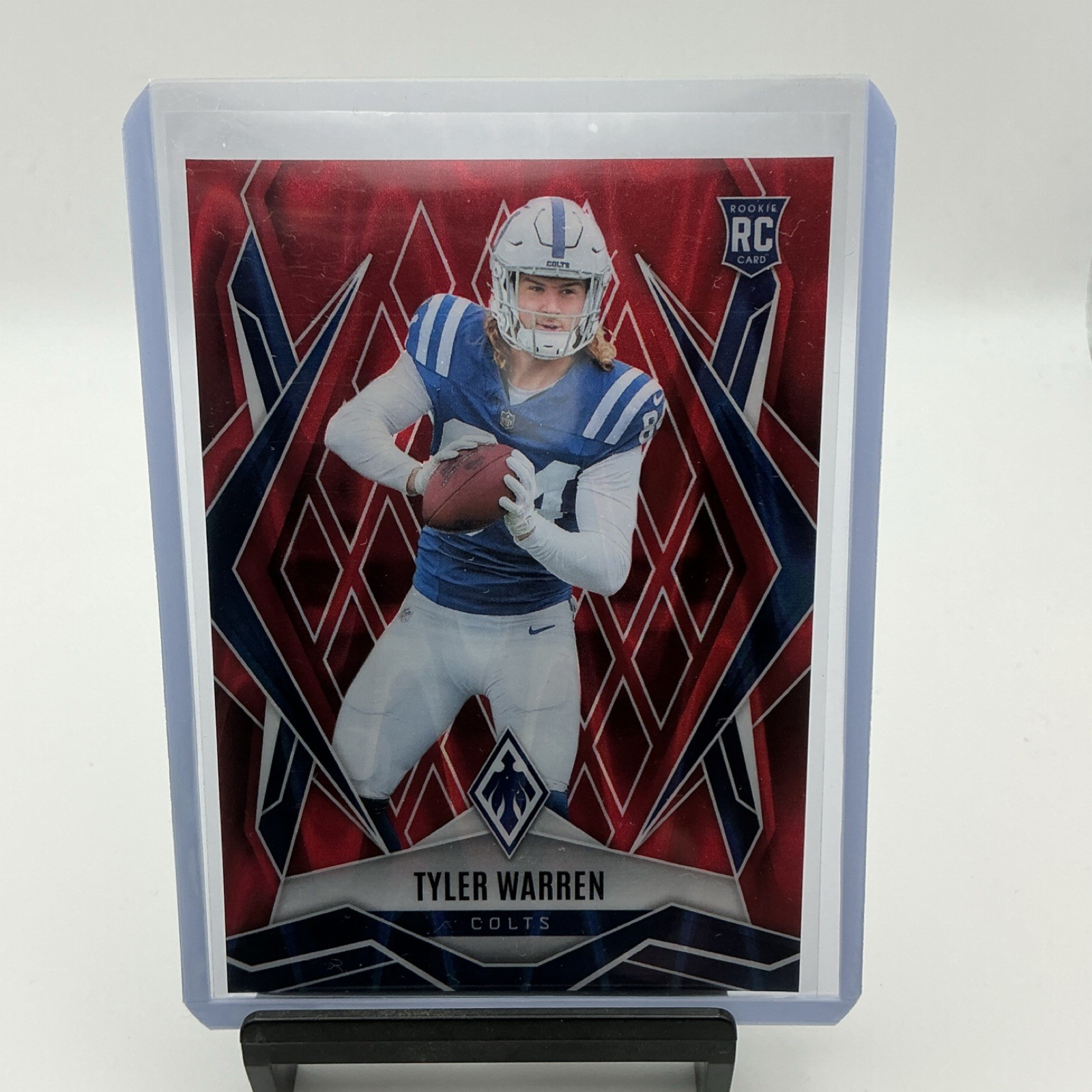 2025 Panini Phoenix - Rookies Tyler Warren #185 Red Seismic /99 (RC)