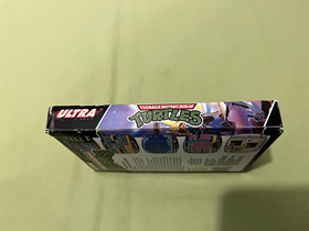 USED TEENAGE MUTANT NINJA TURTLES WITH BOX AND MANUAL NINTENDO NES 1989