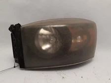 Driver Left Headlight With Black Bezel Fits 06 DODGE 1500 PICKUP 2094447
