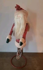 Primative Folk Art WOODEN SANTA ON A UNICYCLE With METAL STAND & THREAD BEARD