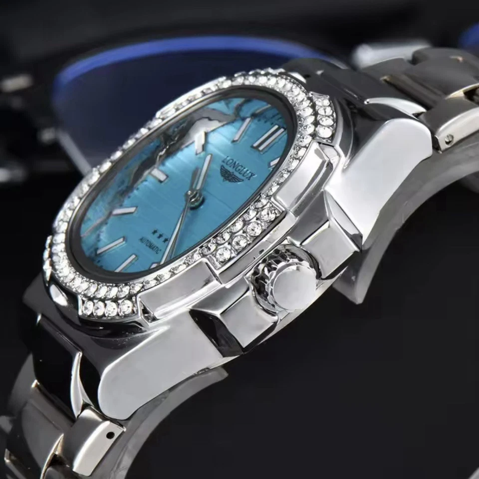 Reloj automático de lujo plateado con esfera turquesa y bisel de diamantes para hombre Foto 4 de 4