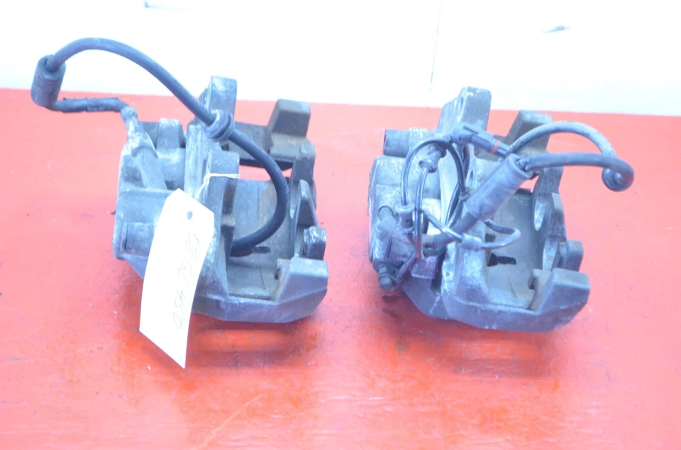 07-12 JUEGO PINZAS FRENO DELANTERO DERECHO/IZQUIERDO MERCEDES X164 CLASE GL OEM Foto 3 de 4