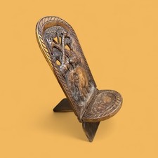 This is an African Hand-Carved African Birthing Chair or a Posing Chair.