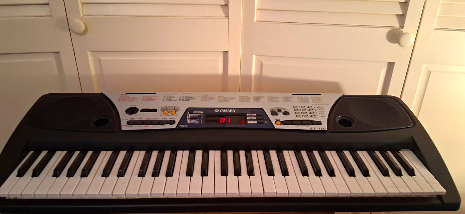Learn To Play Piano The Fun Way!Yamaha EZ-150 61-Lighted Key Electronic Keyboard