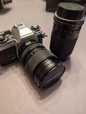 Nikon FG-20 SLR 35mm Film Camera With Extra Lens, Filters, Flash, Instr. and Bag