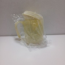 Spill-proof adult sippy cup, also known as a feeding cup or drinking aid.