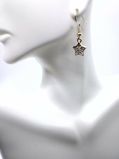 Gold Tone Metal Star Earrings With Clear Rhinestone Center