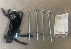 Unused trampoline anchor kit from Smyths Toys Four metal pins and ties