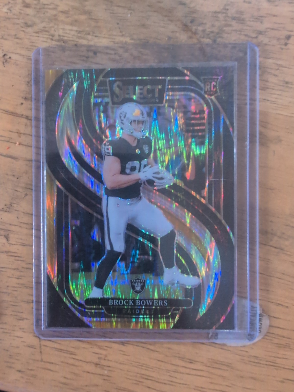 2024 Panini Select - Premier Level Brock Bowers #118 Black & Gold Shock Prizm RC