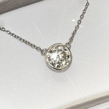 Bezel Set Moissanite Round Solitaire Necklace...
