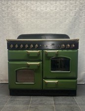 RANGEMASTER CLASSIC LEISURE 110cm FULL GAS RANGE COOKER IN GREEN AND GOLD.