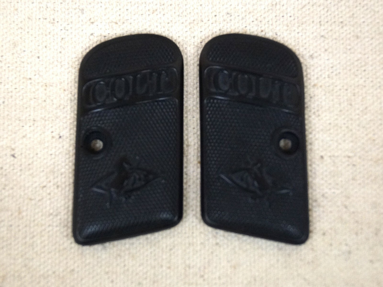 GRIPS FOR .25 CAL EARLY ROUND TOP BLACK CHECKERED WITH NO SCREWS NEW REPRO