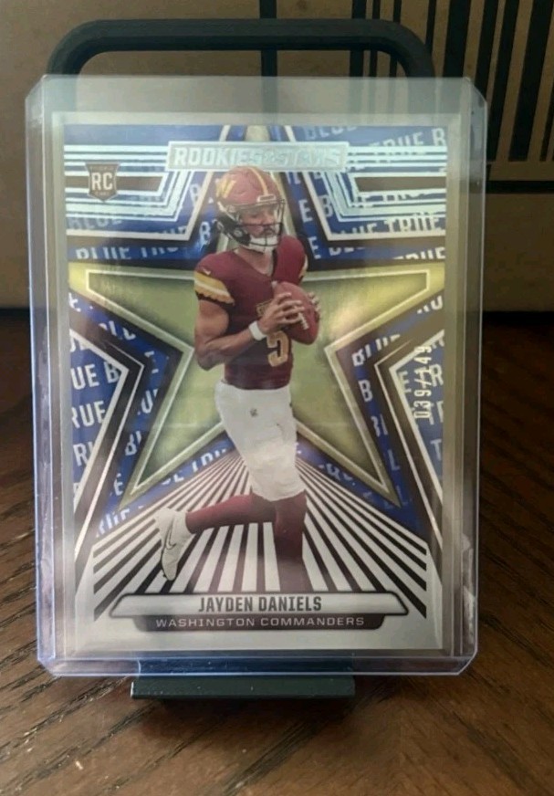 2024 Panini Rookies & Stars - Rookies Jayden Daniels #148 True Blue /149 (RC)