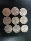 Lot Of (9) Silver Quarters