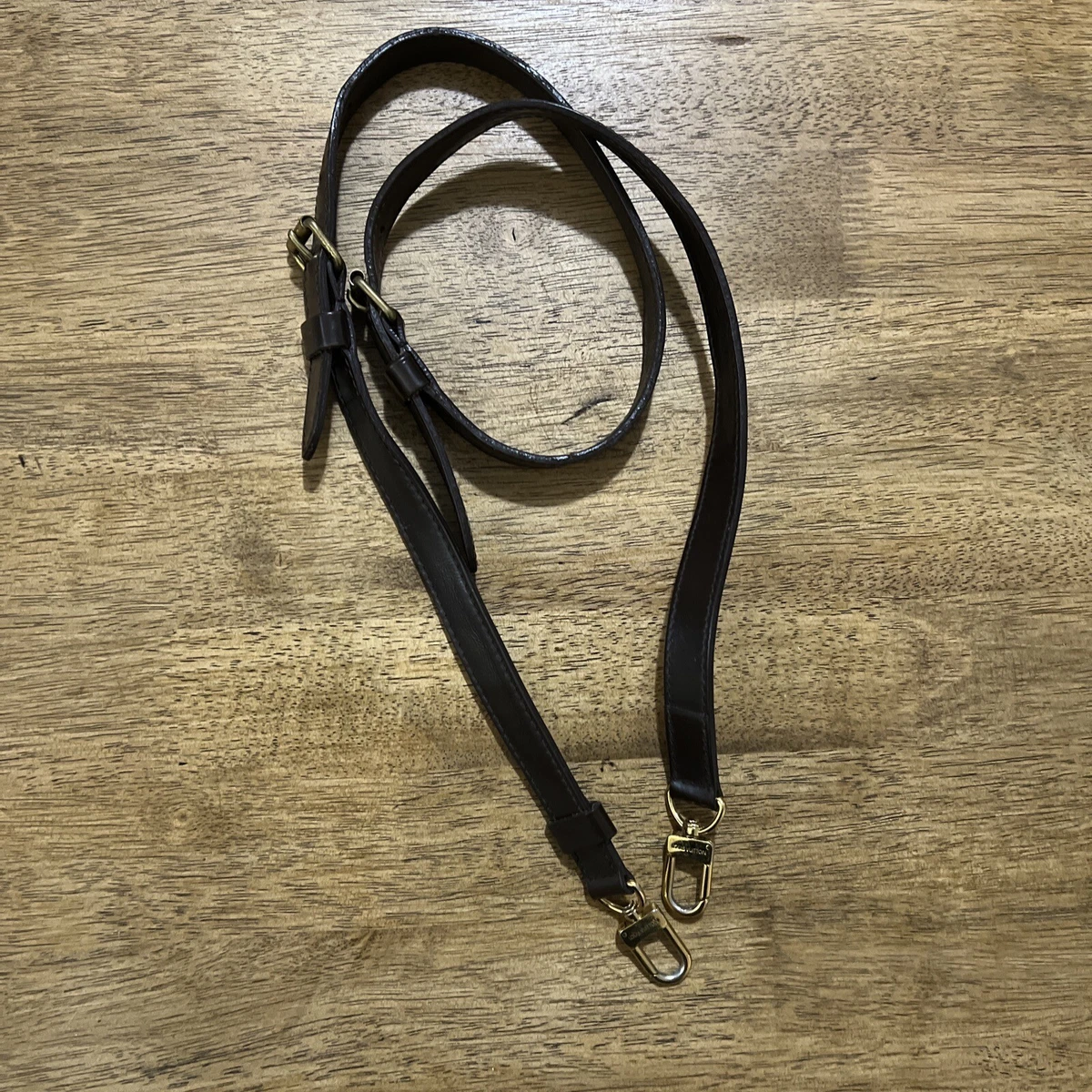 dark brown lv purse strap